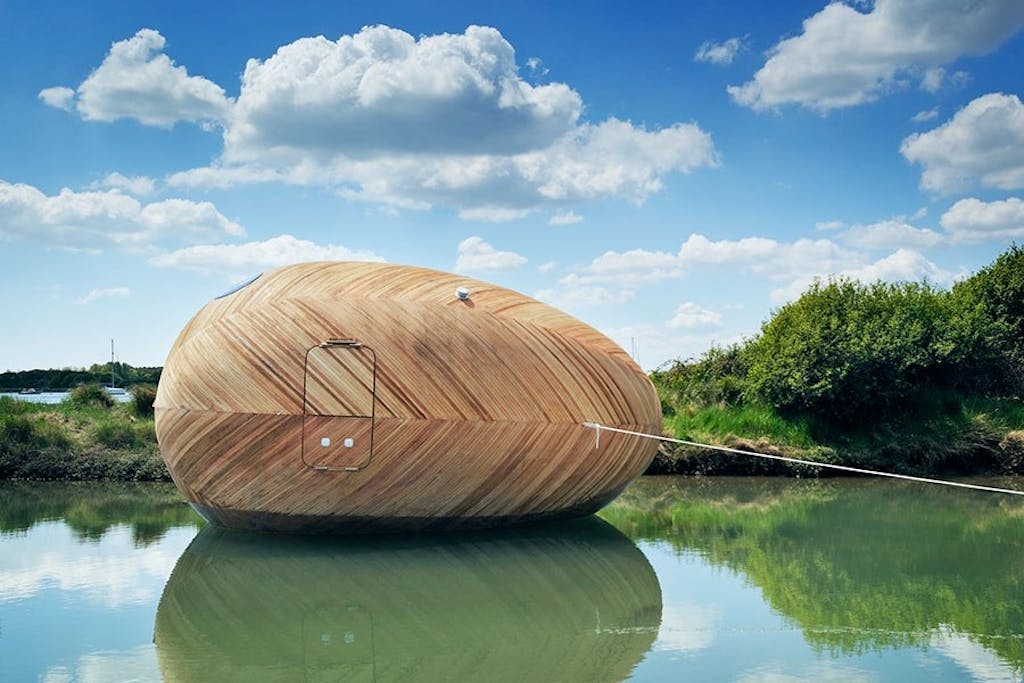 Bo i et æg på en flod i ...