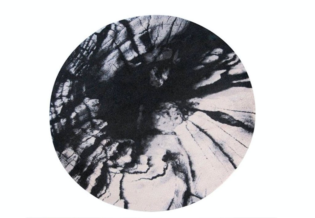 Rundt tæppe med træstub-effekt