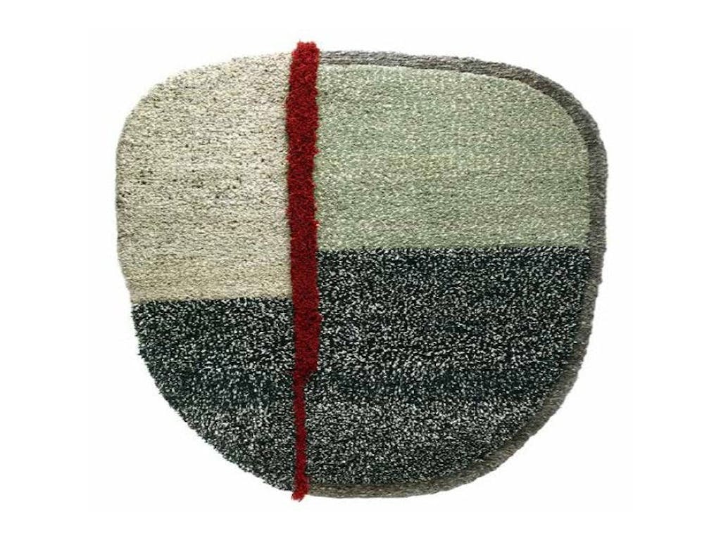 Rundt gulvteppe fra Ames