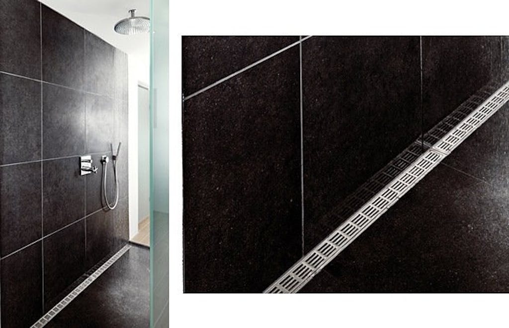 Dusjsluk langs veggen