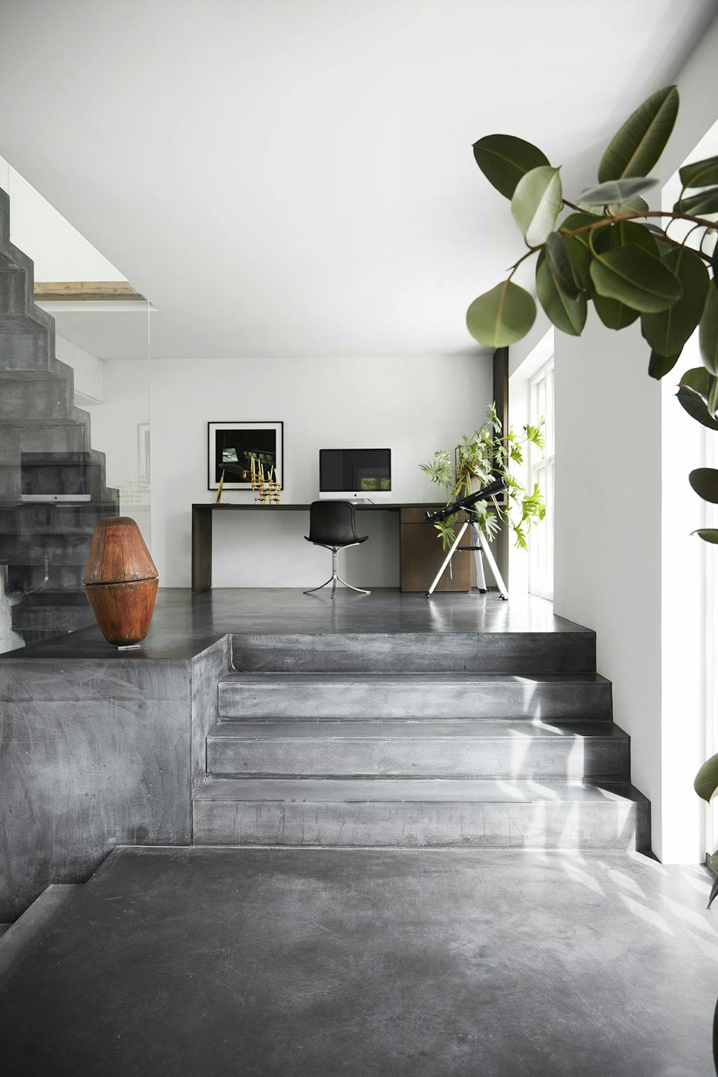 Den nye tilbygning med en kontorplads på reposet Den nye tilbygning med en kontorplads på reposet