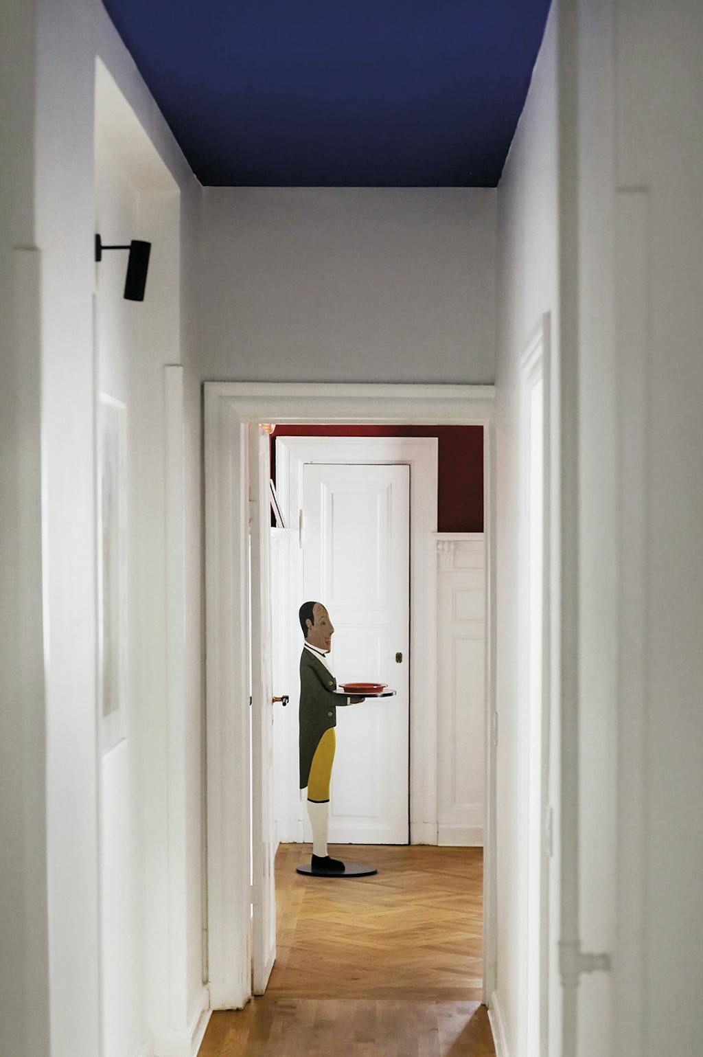 Anker & Co lamp, in gang met parketvloer.