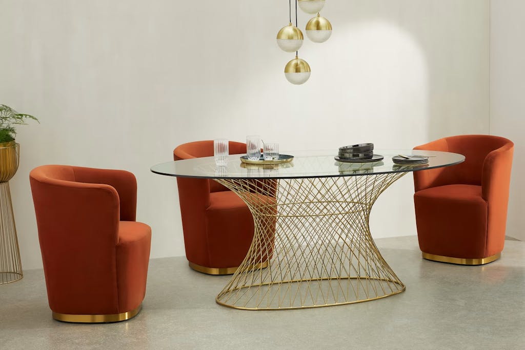 MADE Ovale 6-persoons eettafel, glas en messing