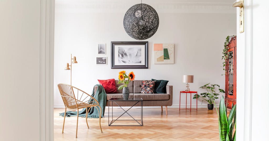 View through an open door into a spacious, unique living room in