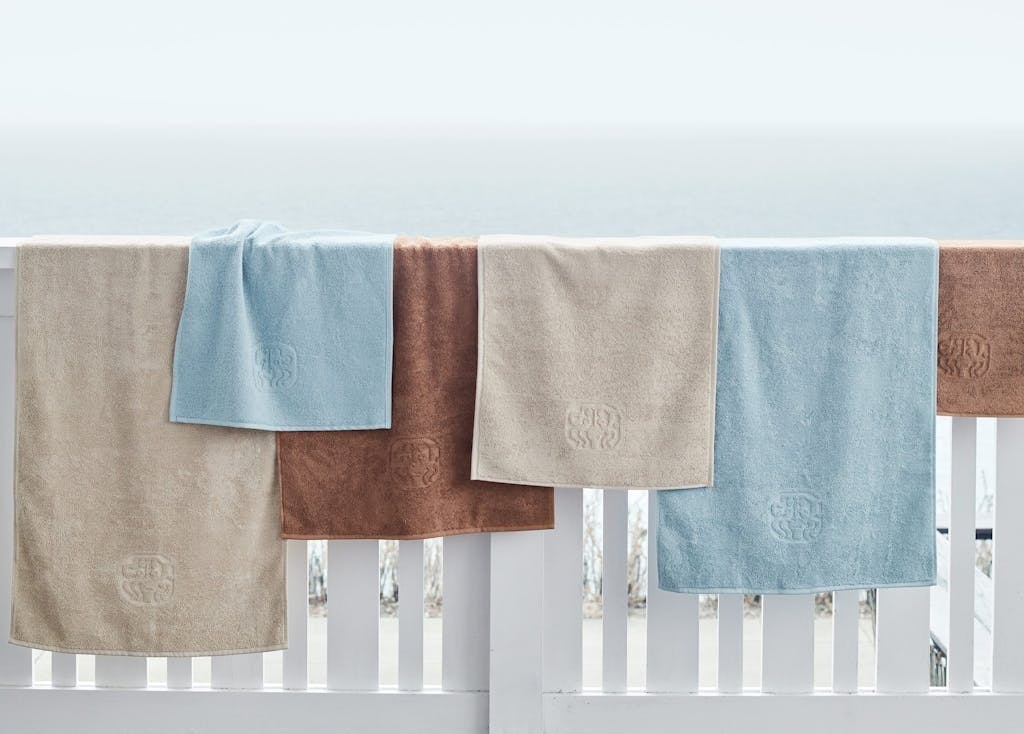 gave til henne luksus håndkle