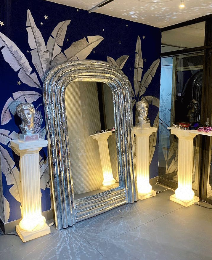 speil med disco-fliser