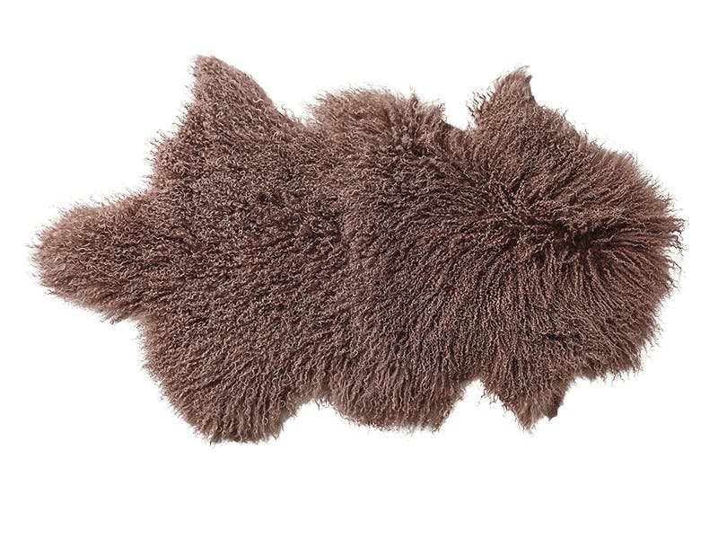 Mykt skinn til å hvile føttene på  Mykt skinn til å hvile føttene på