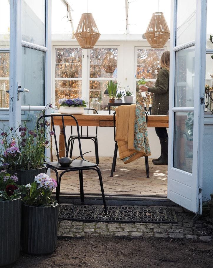 drivhus som fungerer som utestue 