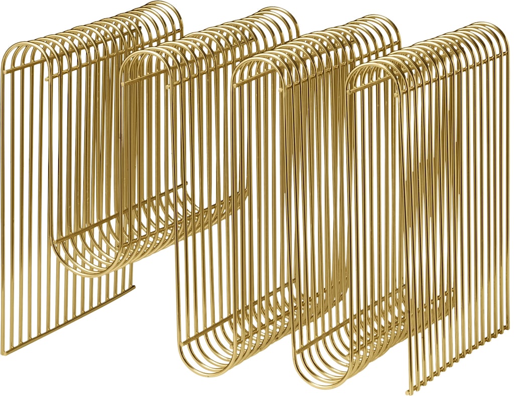 Smuk og skulpturel magasinholder i guld fra AYTM