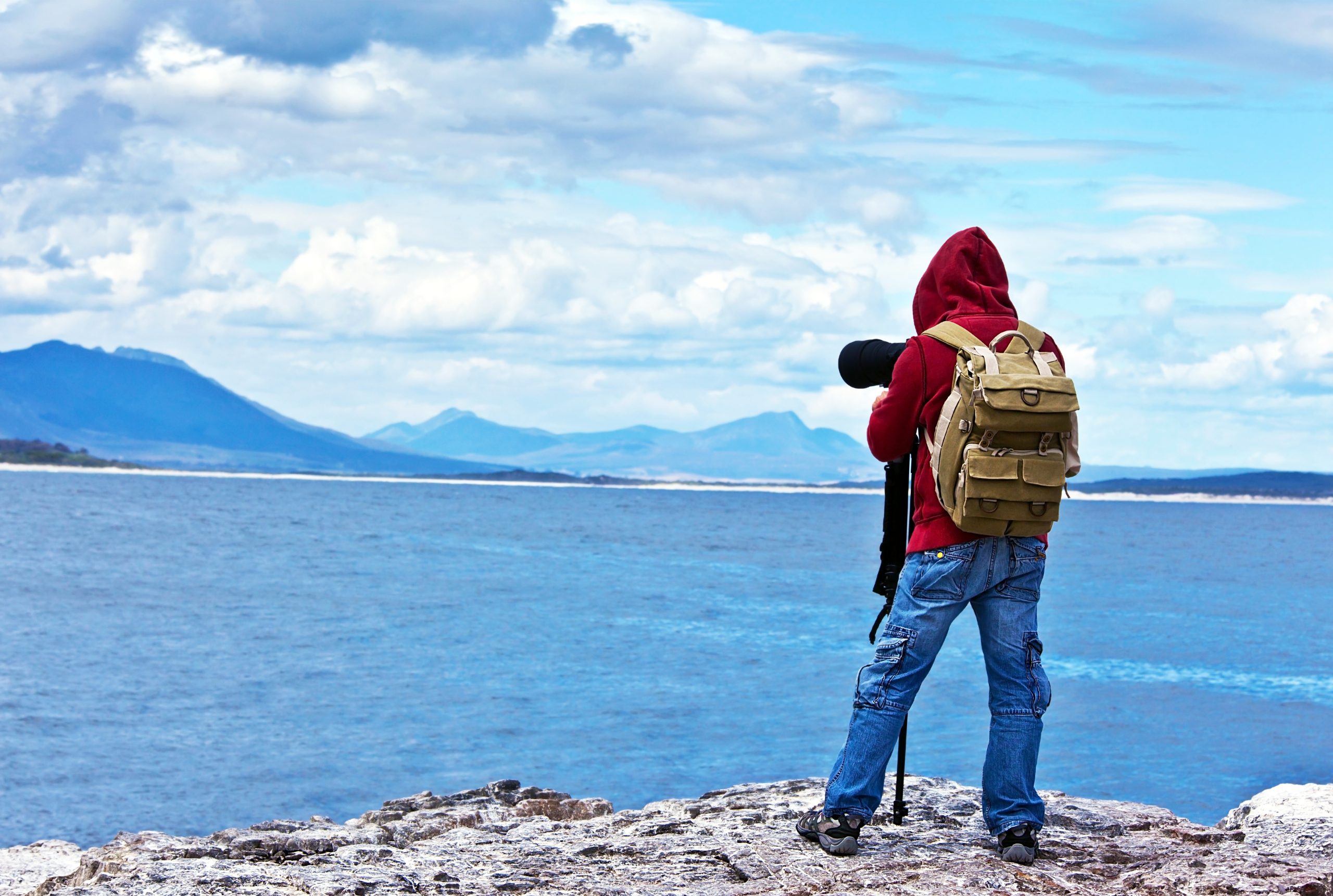 Man fotograferar landskap.