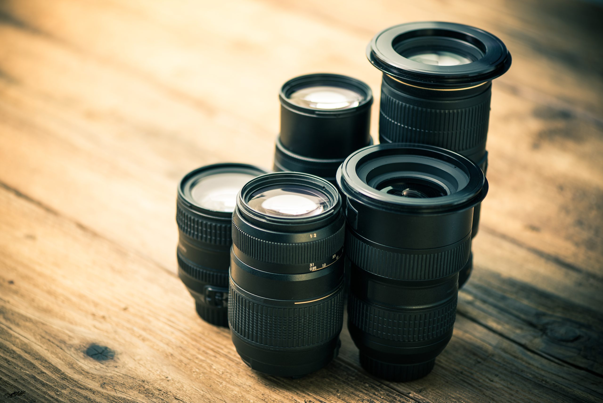 fem forskellige kameraobjektiver
