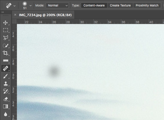 Flekkfjerning med Spot Healing Brush Tool i Photoshop.