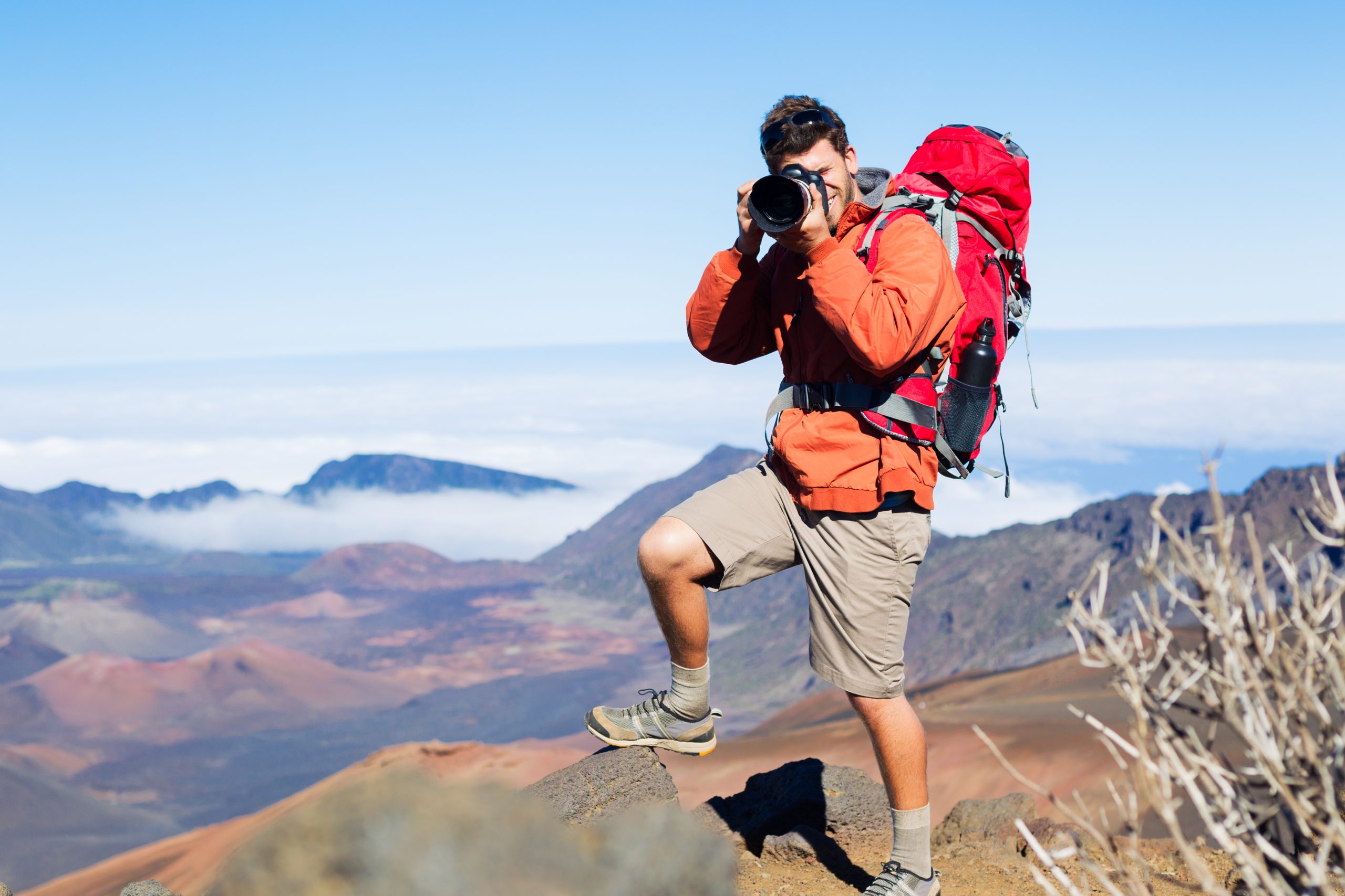 Valokuvaaja ja teleobjektiivi