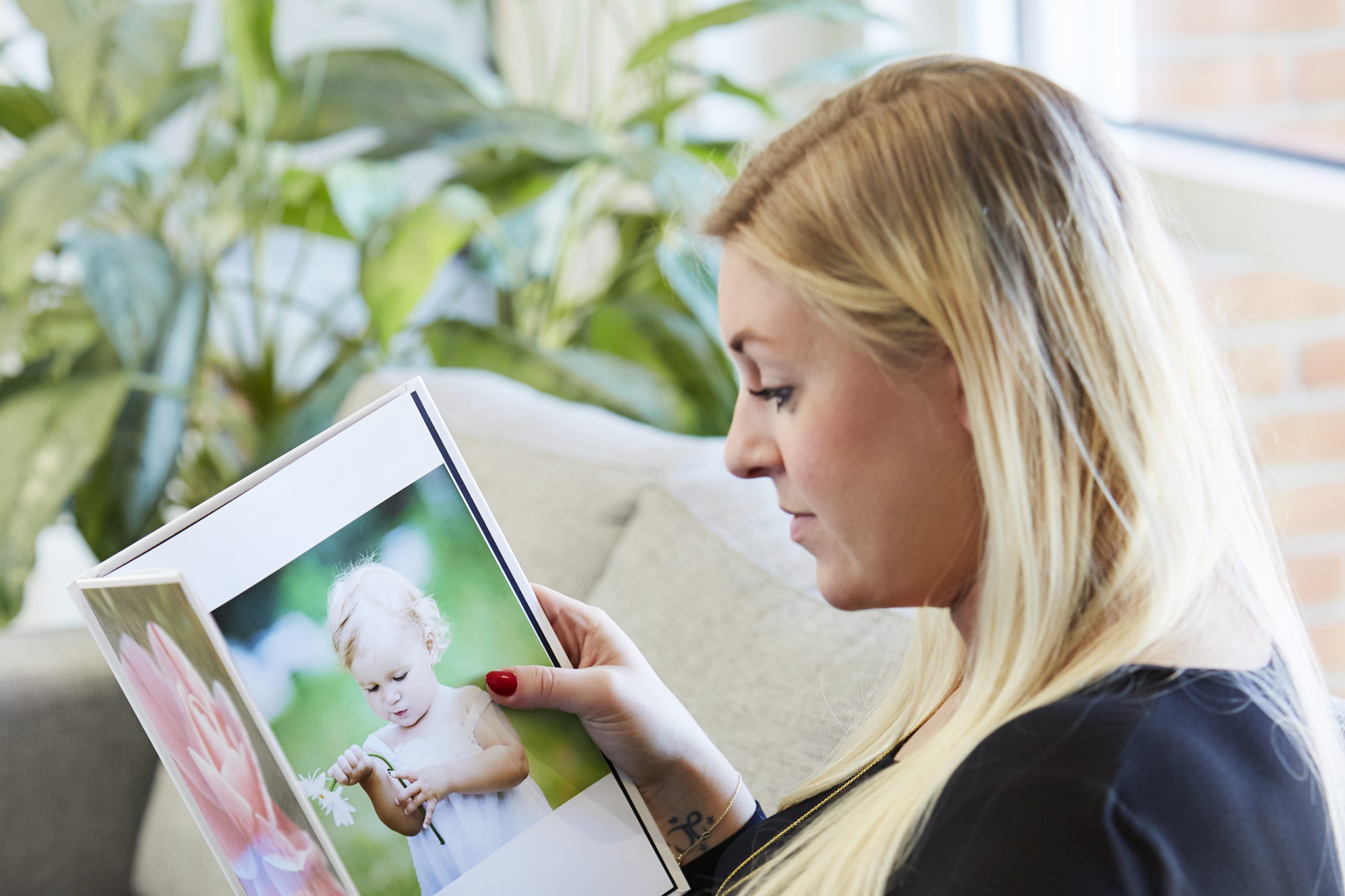 lag din egen fotobok f.eks. Cewe, Elitefoto, FotoKnudsen og Smartphoto.