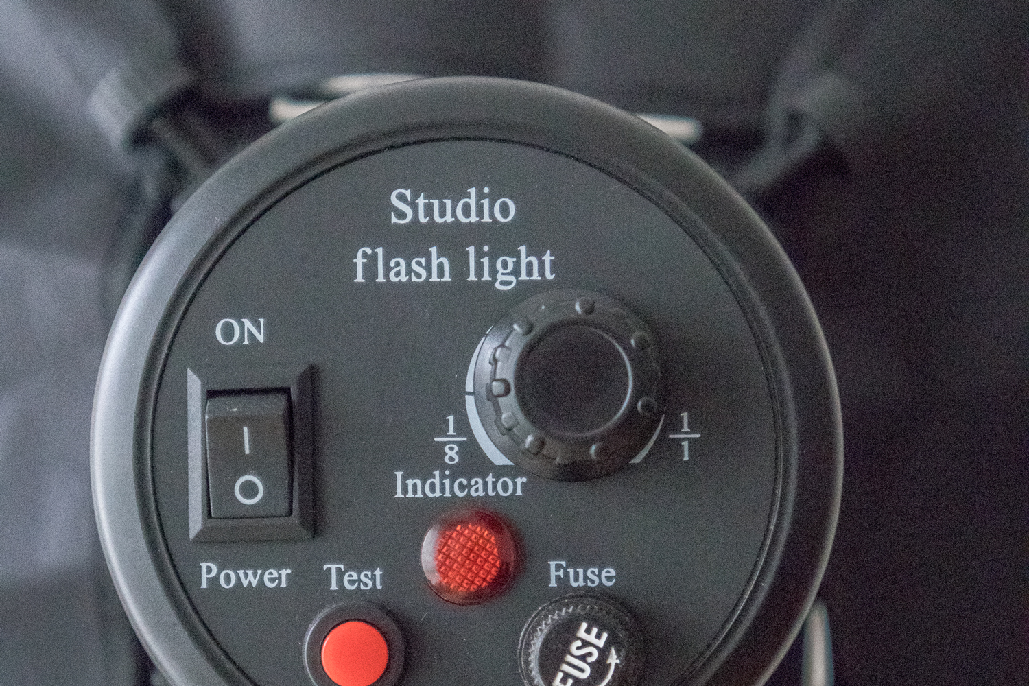 Knappar på studioblixt