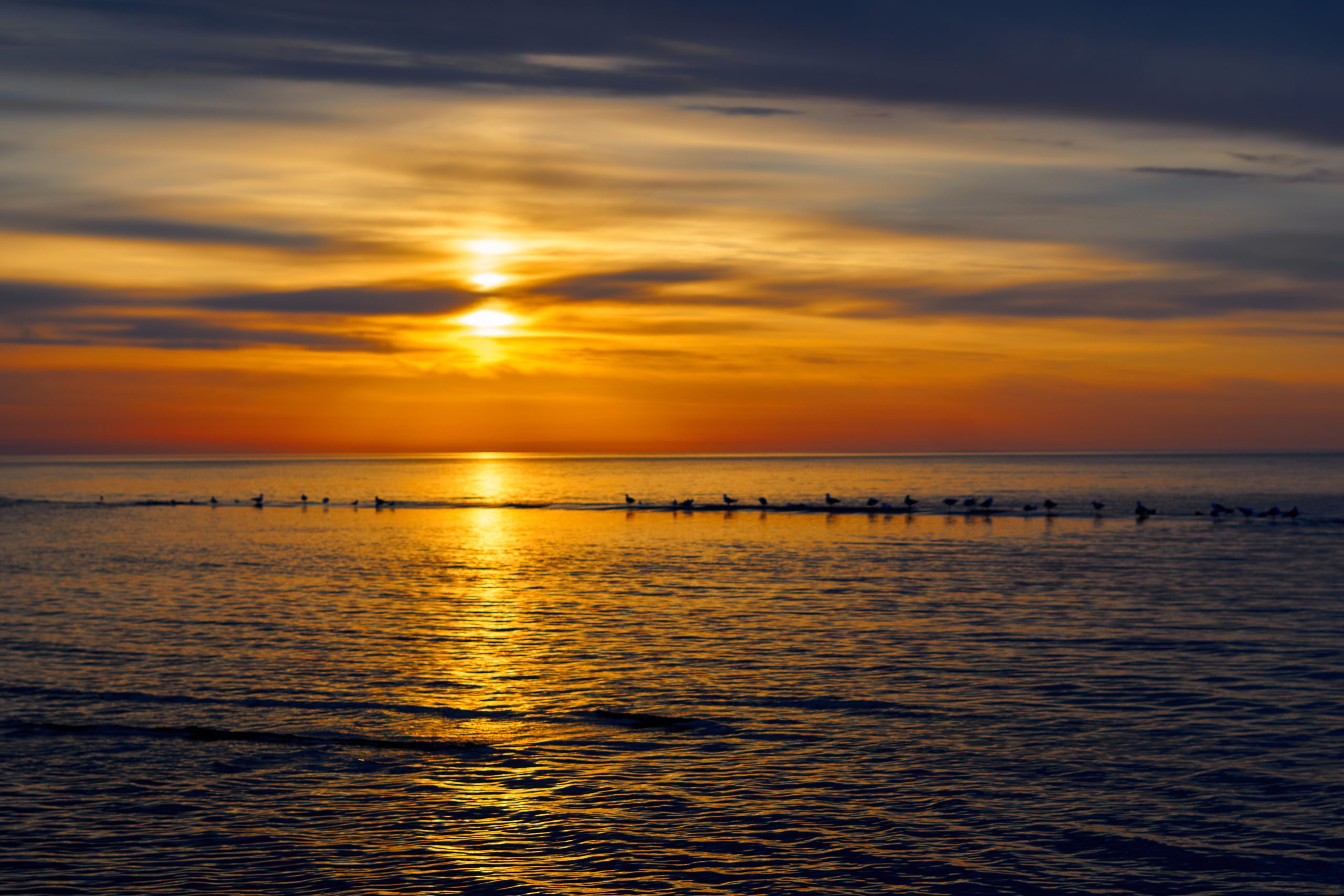 Solnedgang ved havet