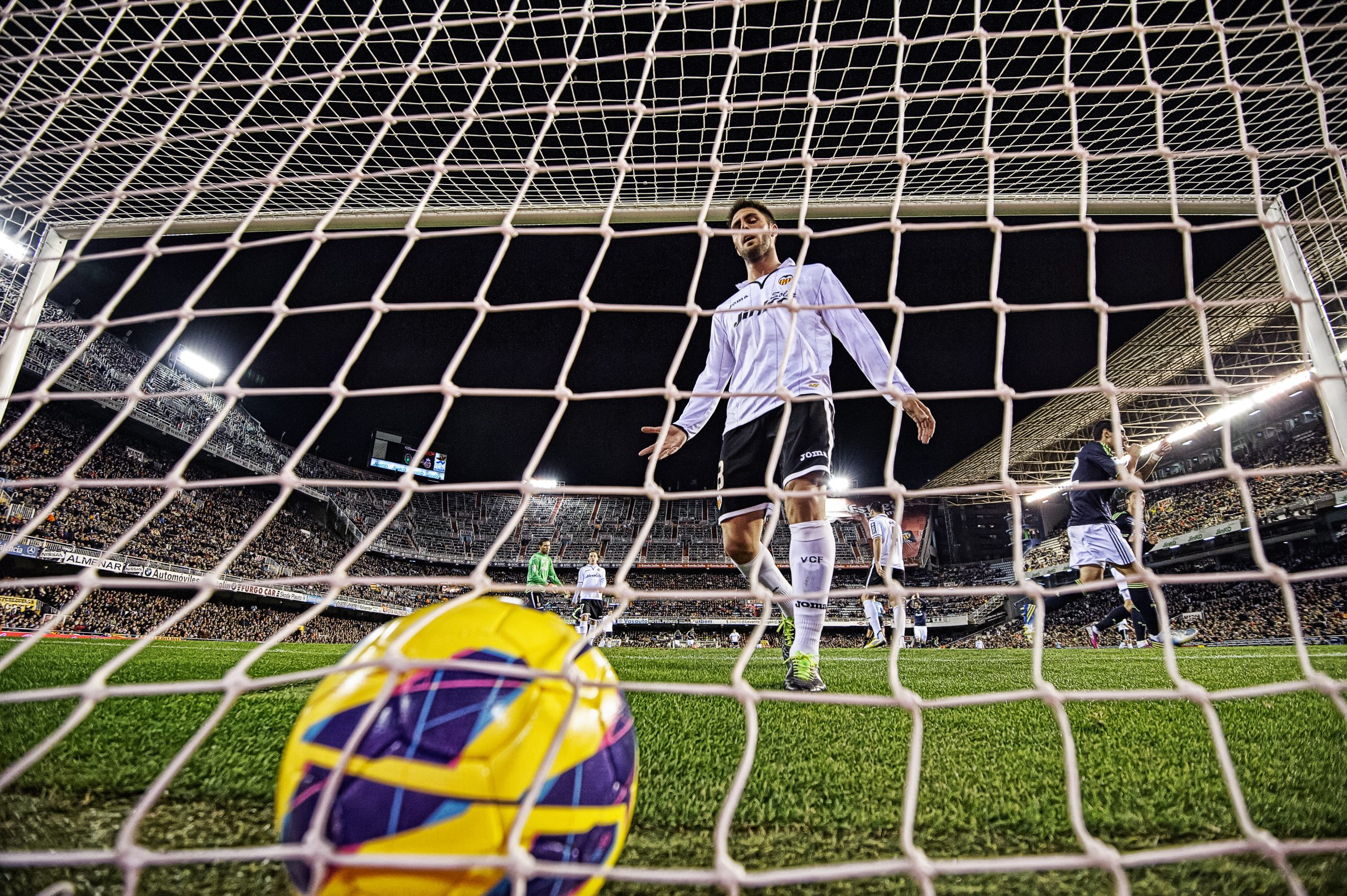 Så tar du professionella sportfoton