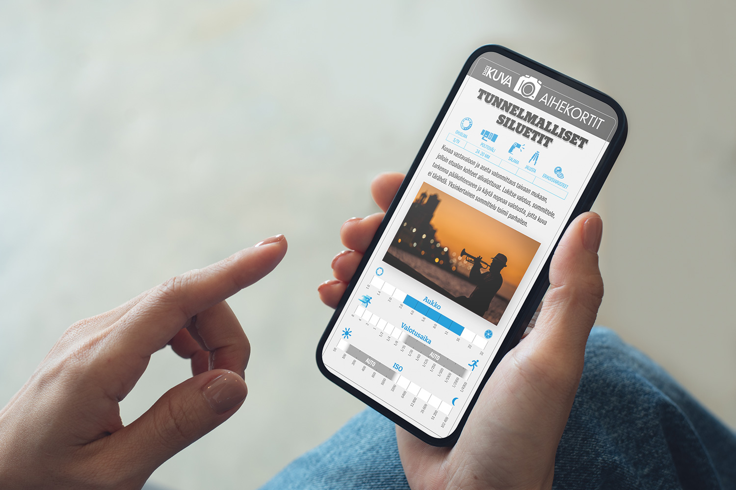 Aihekortti siluettien valokuvaamisesta puhelimen näytöllä.