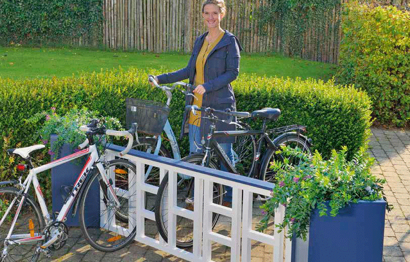 Sykkelstativ med innebygde blomsterkasser