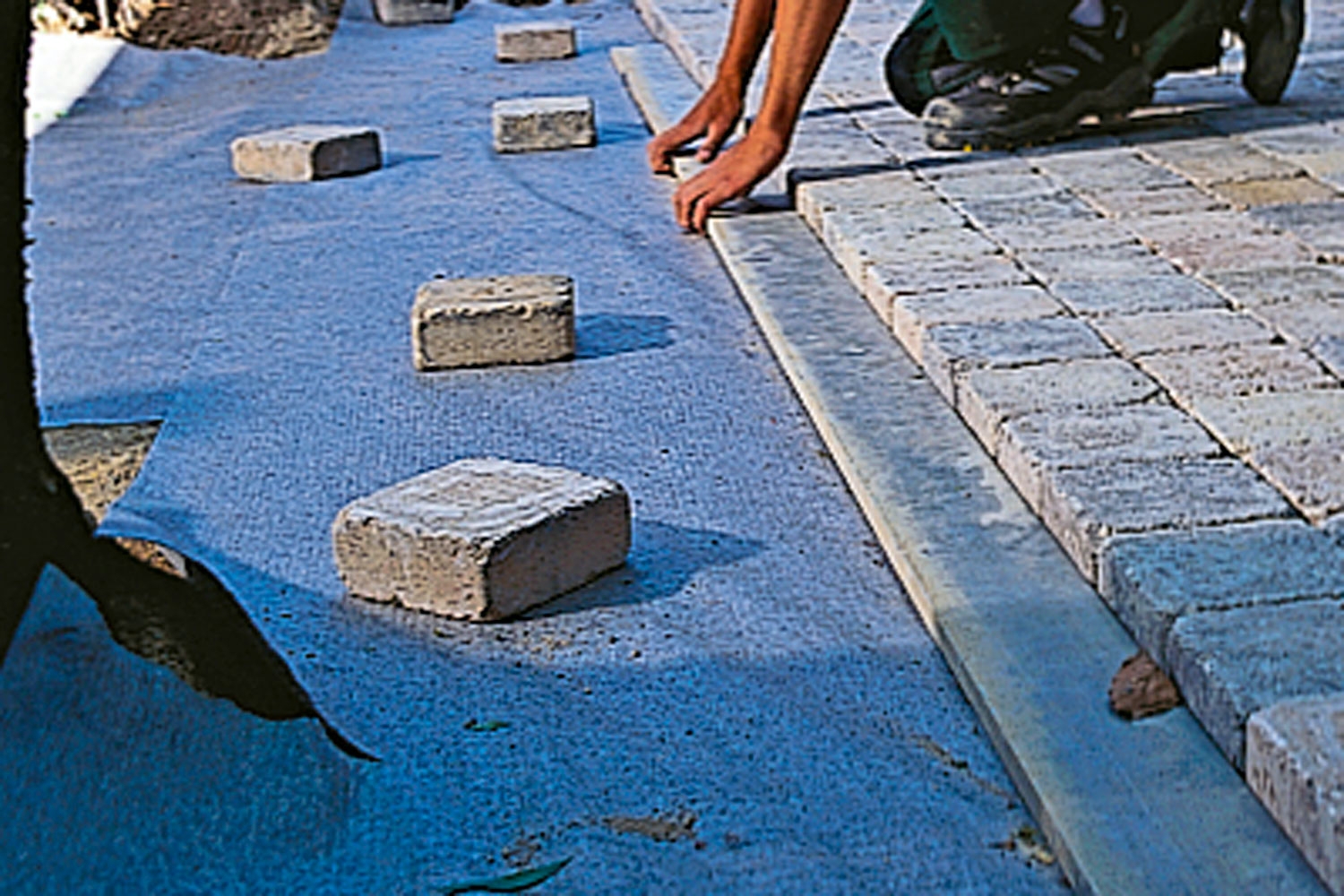 Fiberdug under stenene