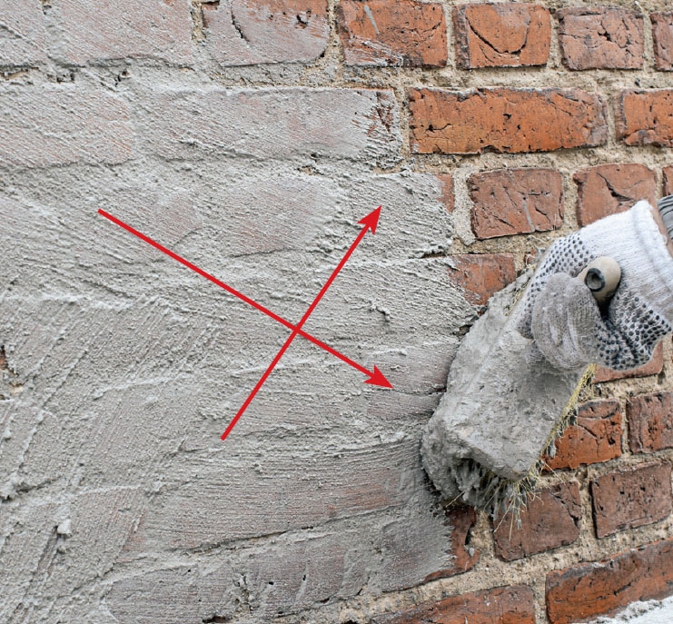 Tiiliseinän rappaus: Laasti levitetään suoraan kostutet-tuun seinään