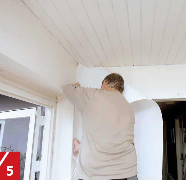 Alustapetin asentaminen lasikuitutapetin päälle