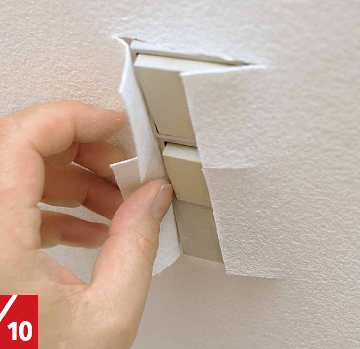 Sähkökytkimien ja rasioiden kohdalle tehdään alustapettiin ristiviillot