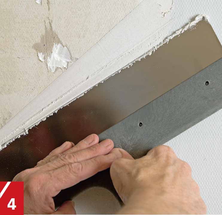 Lasikuitutapetin ruuvinreiät ja kolot täytetään hienotasoitteella