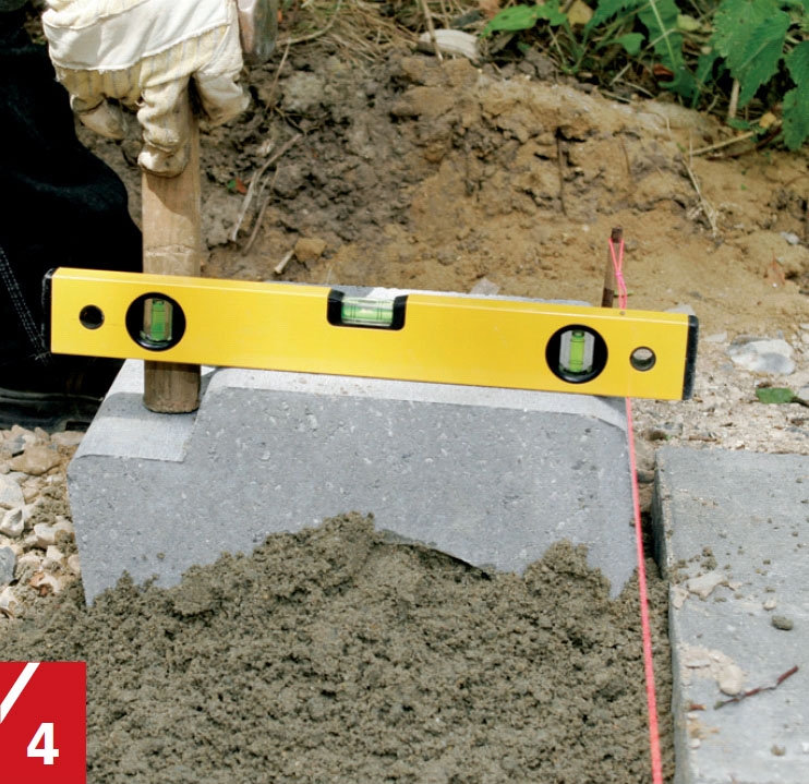 Byg en solid støttemur i haven