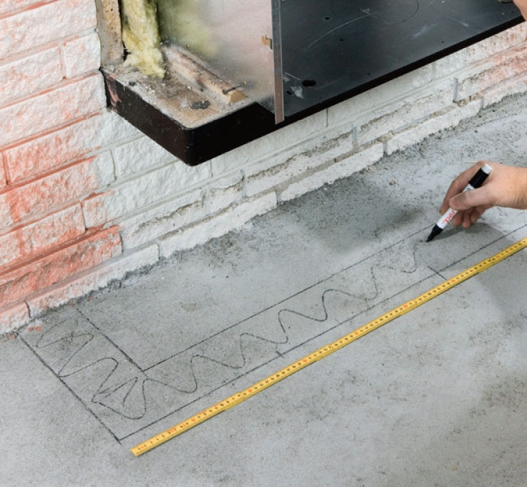 Braskassett: Den nya väggen markeras på golvet