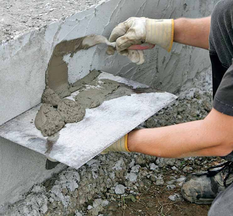 Gjuta garageplatta: Därefter påförs det tredje lagret puts