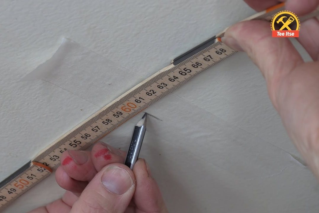 Merkitse maalarinteipillä