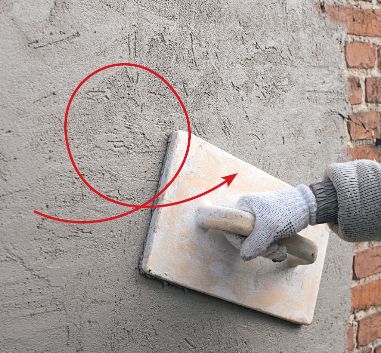 Murpuss: Mørtelen masseres inn i murverket med det harde pussebrettet