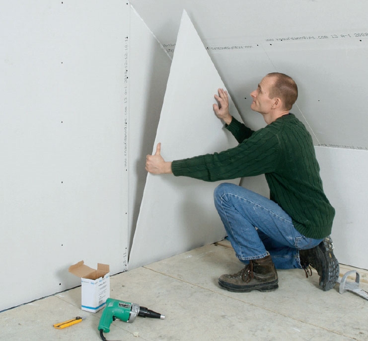 Inreda vind: Sätt upp nästa skikt gipsskivor på gaveln