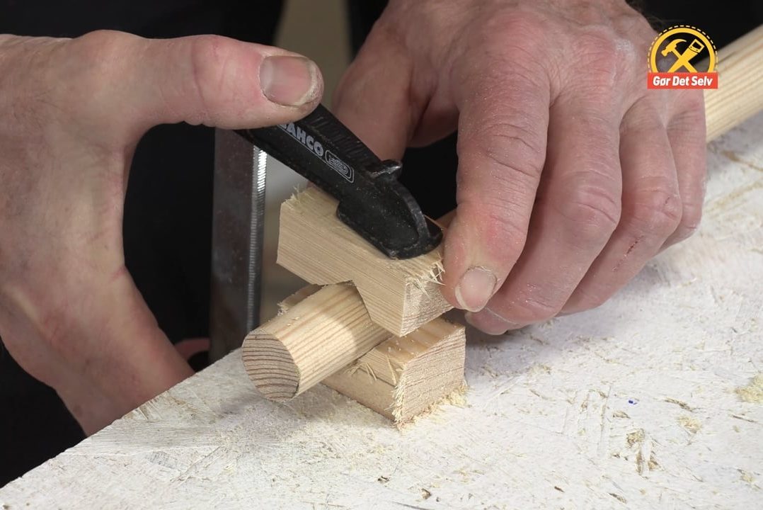 Holder til rør og rundstokke