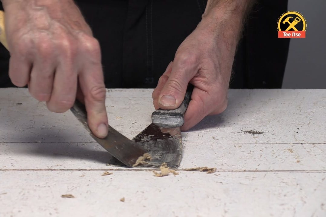 Puhdista kuivunut liima tasoitteesta