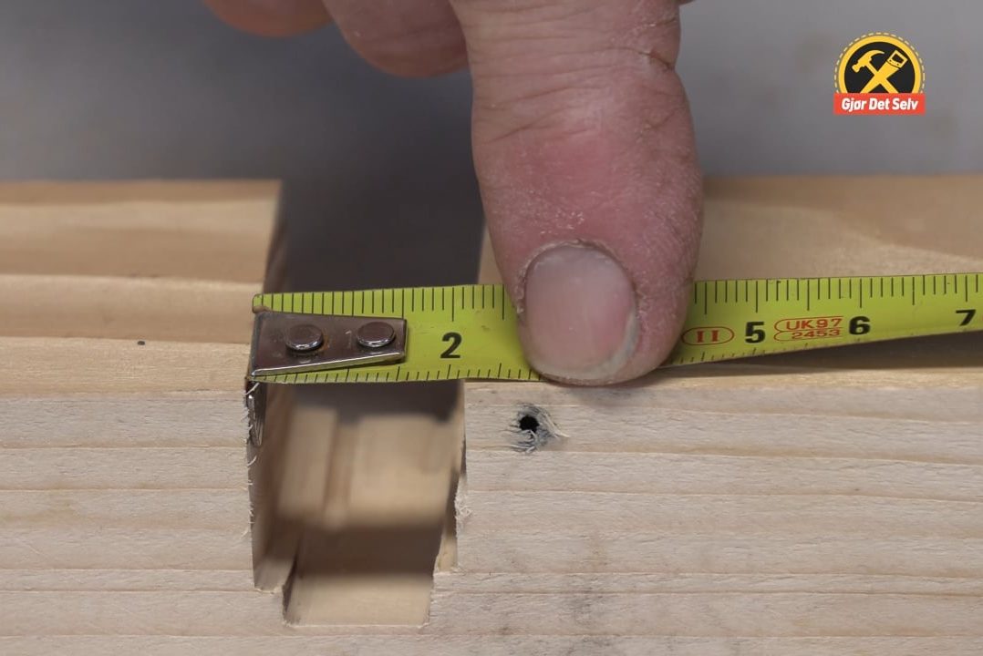 Bruk spissen på målebåndet