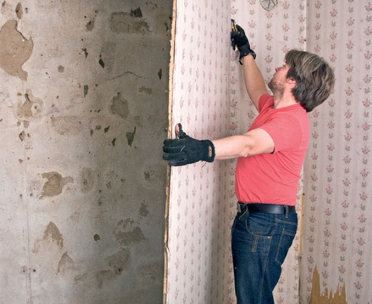 Porebetong isolering: Vi fjerner den myke masonitten med tapet fra veggen