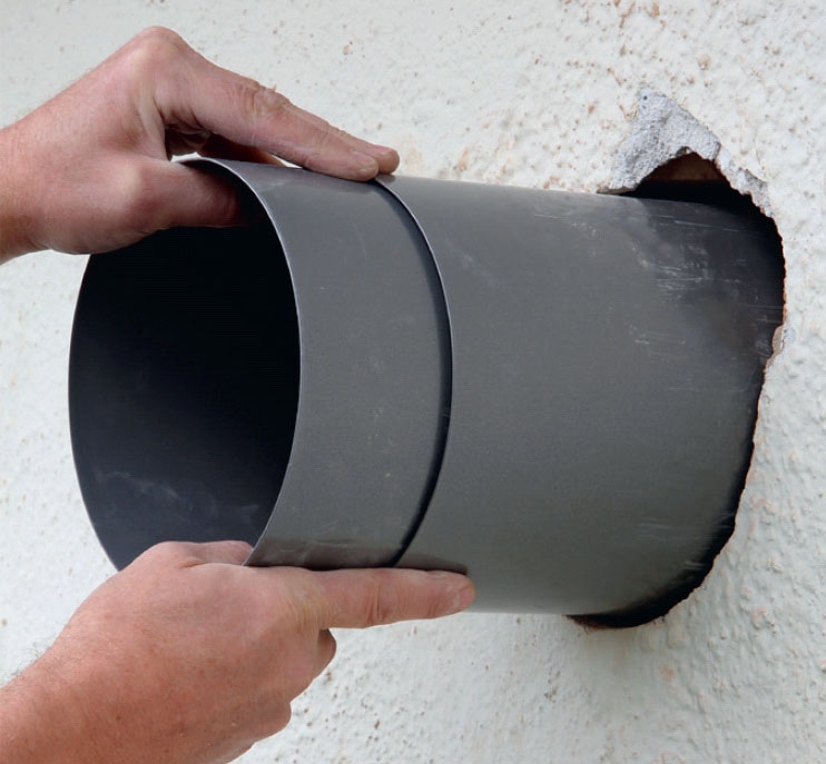 Tyst köksfläkt: Stick in teleskopröret i hålet