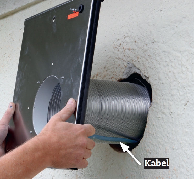 Tyst köksfläkt: Skruva loss bakstycket från motorn