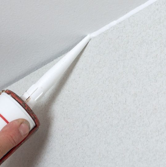 Varmväggsskivor: Täta med fogmassa som kan målas över