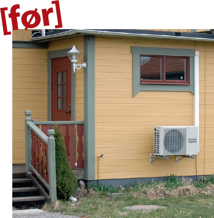 Luftvarmepumpen sidder på væggen uden varmepumpeskjuler