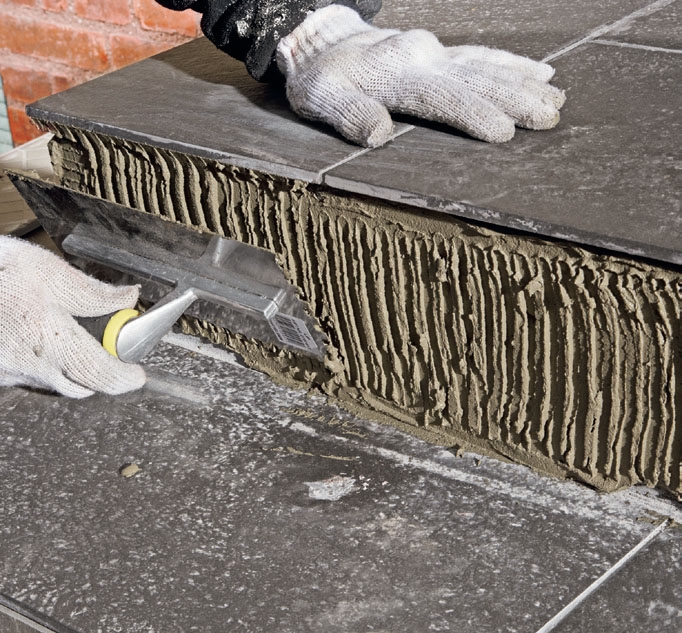 Klinker trappa: Fördela kakelfix på sättstegen