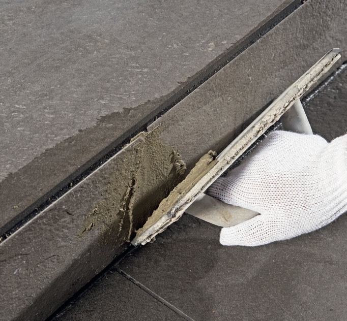 Fliser inngangsparti ute: Opptrinnene fuges med lys fugemasse