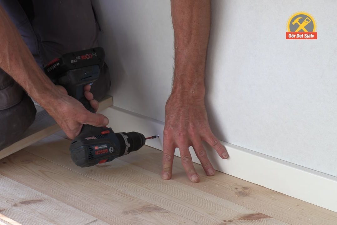 Tryck ner golvlisten