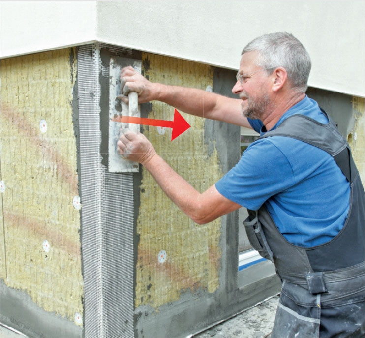 Sokkelin eristys: Vahvista ulkokulmia teräskiskoil-la, jotka työstetään laastiin