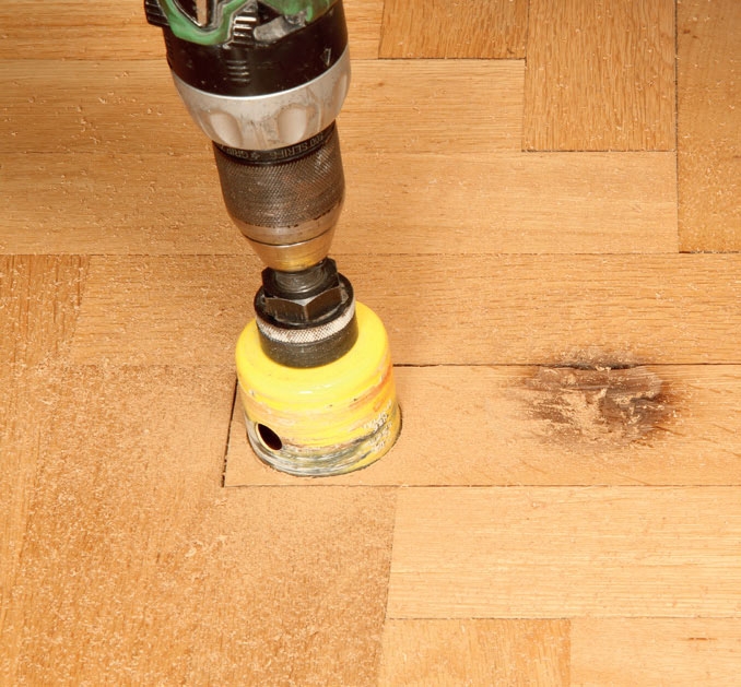 Udskiftning af stave i parketgulv
