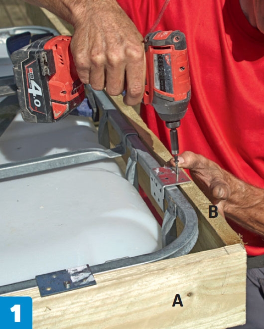 Skjul til regnvandsbeholder