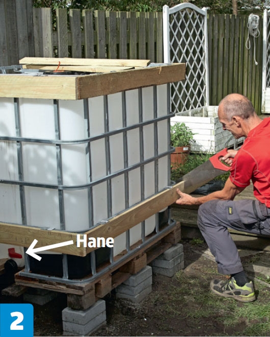 Skjul til palletank til regnvand