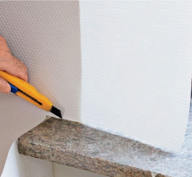 Tapetsere hjørner: Skjær vannrett inn i lengden